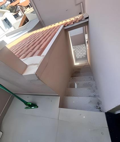 a view of a stairway with a roof at Studio kitnet apartamento Privativo Jundiai 12 in Jundiaí