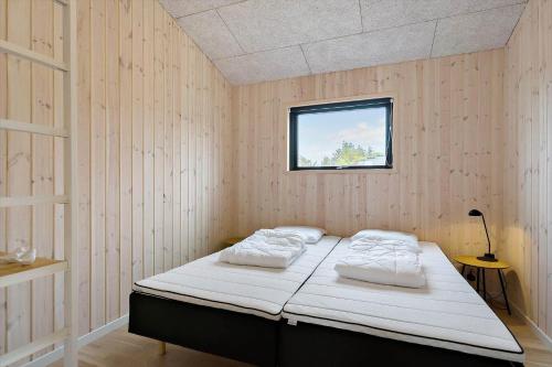 Ένα ή περισσότερα κρεβάτια σε δωμάτιο στο BL1557-Saltum-Tolhoj-52