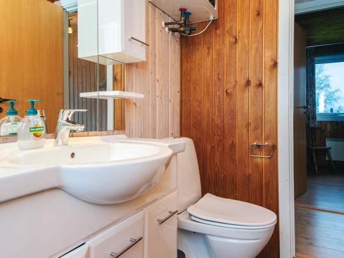 a bathroom with a sink and a toilet at 6 person holiday home in Fårvang in Fårvang