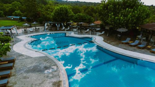 an image of a swimming pool at a resort at Hotel Epavlis in Káto Poróïa