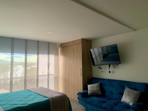 TV a/nebo společenská místnost v ubytování Estocolmo magnífico aparta estudio 307