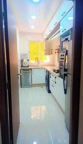 Kuchyň nebo kuchyňský kout v ubytování Appartement,kech