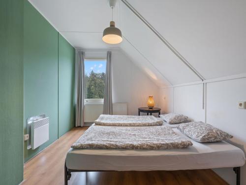 Кровать или кровати в номере Holiday Home Lužnice by Interhome