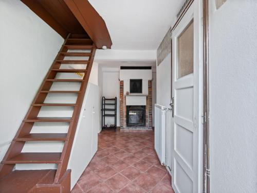 a staircase in a room with a door at Holiday Home Lenora II by Interhome in Lenora