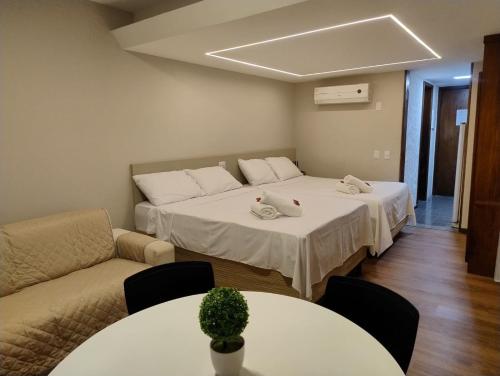 Ένα ή περισσότερα κρεβάτια σε δωμάτιο στο Flat Encanto Baiano