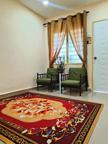 Postel nebo postele na pokoji v ubytování Puteri Duyong Homestay