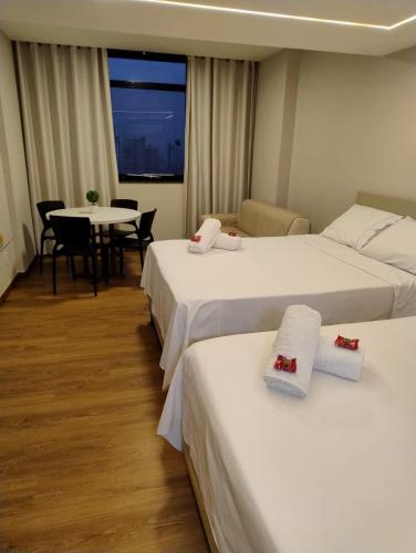Ένα ή περισσότερα κρεβάτια σε δωμάτιο στο Flat Encanto Baiano