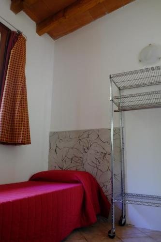 Ένα ή περισσότερα κρεβάτια σε δωμάτιο στο Campeggio Villaggio San Giorgio Vacanze