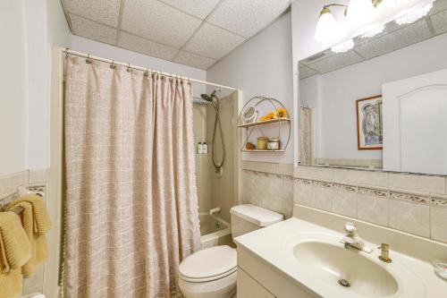 a bathroom with a sink and a toilet and a shower at Pet-Friendly Catskills Home with Serene Pond! in Jefferson