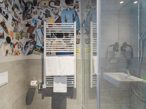 Un baño de Holiday Inn - the niu, Saddle Fürth by IHG