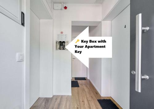 a hallway with a key box with your apartment key at Apartments Trnovo in Ljubljana