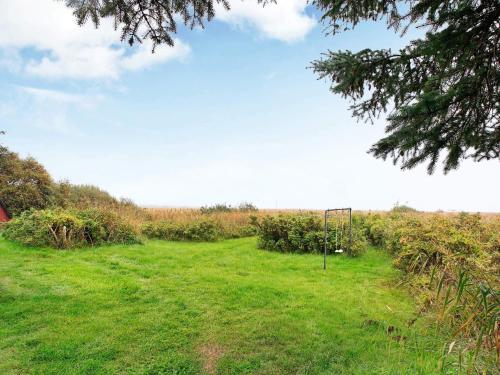 a field with a goal in the grass at 4 person holiday home in Rømø in Lakolk