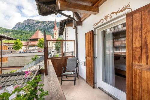 a balcony with a view of a mountain at Garni Crepaz in Selva di Val Gardena