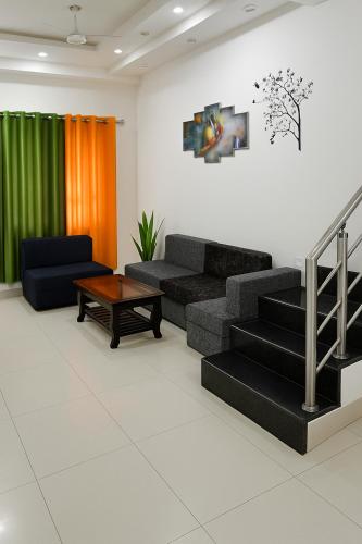 Ruang duduk di Premium Villa's Vrindavan