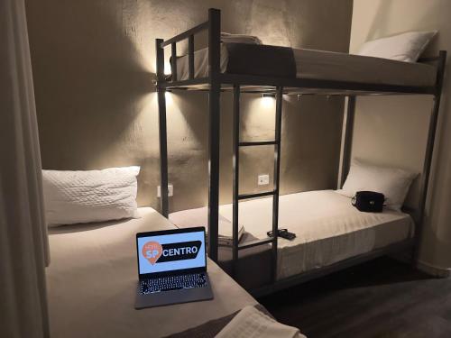 Ένα ή περισσότερα κρεβάτια σε δωμάτιο στο Hotel SP Centro