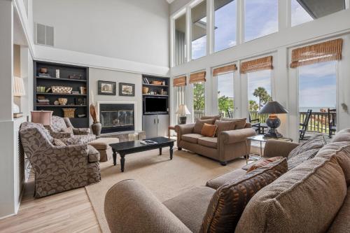 a living room filled with furniture and a fireplace at Southern Dunes home by Peace Vacations in Georgetown