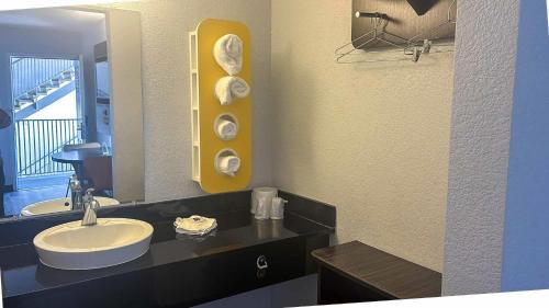 a bathroom with a sink and a mirror at Motel 6-Watsonville, CA - Monterey Area in Watsonville