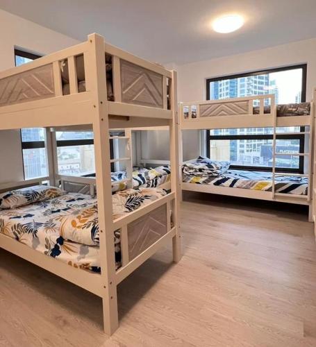 Postelja oz. postelje v sobi nastanitve Expedite Homes