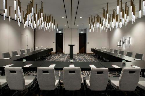 a conference room with a long table and chairs at Marriott Springfield Downtown in Springfield