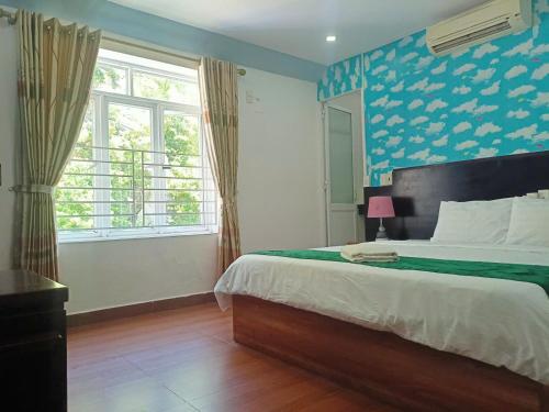 Una cama o camas en una habitación de catba island hotel