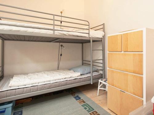 a bunk bed room with two bunk beds in it at 6 person holiday home in Dronningmølle-By Traum in Dronningmølle