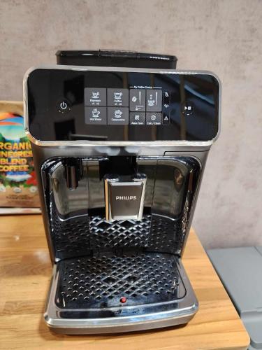 a coffee maker is sitting on a table at In68 House in Ch'ih-k'an-lou