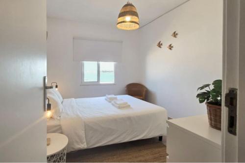 Beach House on Faro Island with a Dreamy Terrace and 7 Beds for the Perfect Escape
