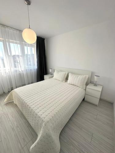 Ένα ή περισσότερα κρεβάτια σε δωμάτιο στο Olympus Residence 5
