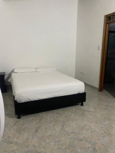 Ein Bett oder Betten in einem Zimmer der Unterkunft Casa MAVA