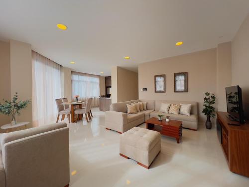 Χώρος καθιστικού στο Apartamento céntrico con vista a la ciudad de Loja
