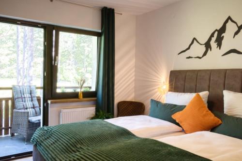 Ένα ή περισσότερα κρεβάτια σε δωμάτιο στο Waldblick by Dollop Living