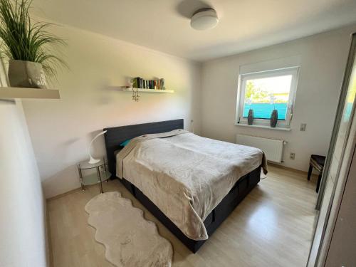 Postel nebo postele na pokoji v ubytování Ferienwohnung-Brockenblick