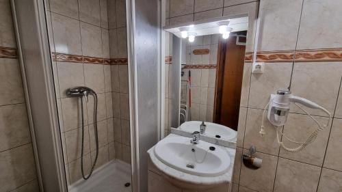 Koupelna v ubytování Apartamentos Grifo Vacances Grizzly