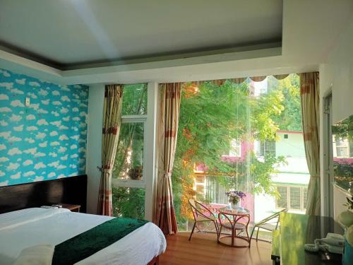 Una cama o camas en una habitación de catba island hotel
