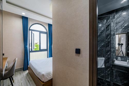 Koupelna v ubytování Lalisa Hotel Grand World Phu Quoc