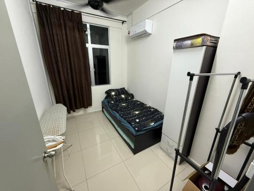 Ένα ή περισσότερα κρεβάτια σε δωμάτιο στο HSL Homestay Meru