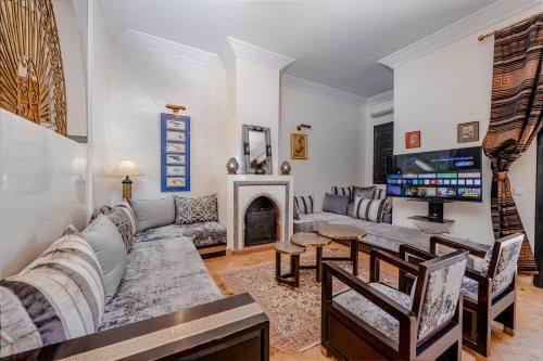 TV a/nebo společenská místnost v ubytování Residence Dar Lamia Marrakech