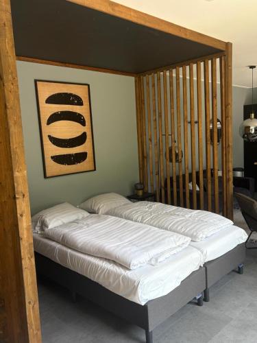 Katil atau katil-katil dalam bilik di Europarcs de Achterhoek huisje 86A