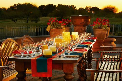 a long table with wine glasses on top of it at Scottsdale Marriott at McDowell Mountains in Scottsdale