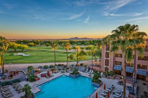 an aerial view of a resort with a pool and palm trees at Scottsdale Marriott at McDowell Mountains in Scottsdale