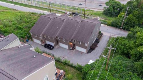 an overhead view of a house with a black roof at The City Staycation Condo - Downtown Cincy Views in Covington