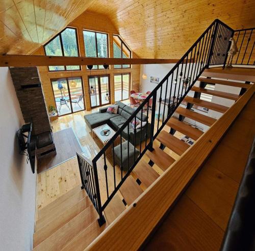 an overhead view of a staircase in a house at Planinska kuća Lastino gnezdo in Bajina Bašta