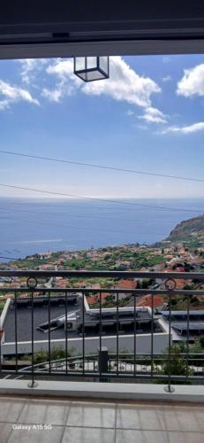 a view from a window of a train at ARTIST HOUSE Rooms With View And Shared Kitchen in Arco da Calheta