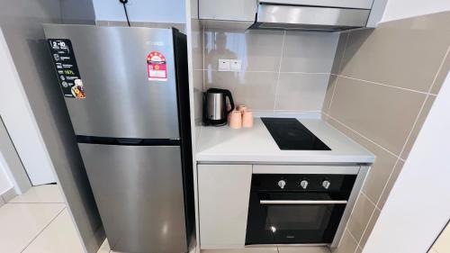 Η κουζίνα ή μικρή κουζίνα στο Trion KL Premium Residence