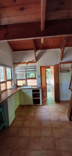 a kitchen with a sink and a counter top at חווה של דני in Bet Hillel