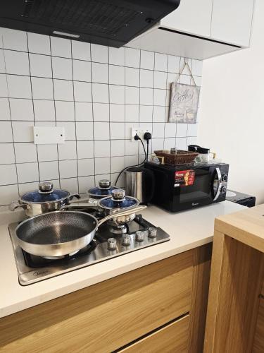 Η κουζίνα ή μικρή κουζίνα στο Reily Luxury Homes-1 bedroom, Syokimau near JKIA & SGR, PARK VIEW