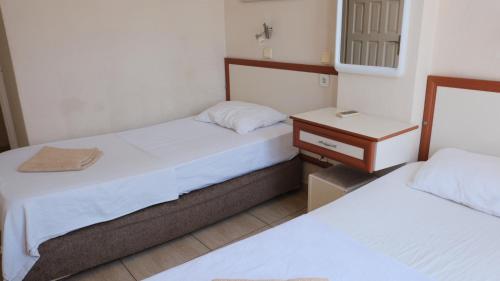 Katil atau katil-katil dalam bilik di İSABELLA APART OTEL