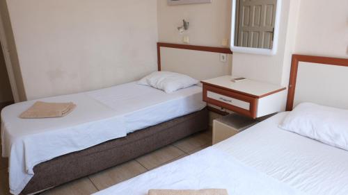 Katil atau katil-katil dalam bilik di İSABELLA APART OTEL