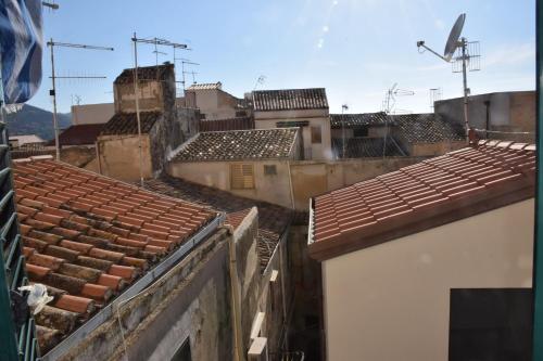 a view of roofs of buildings in a city at Appartamento Osnao in Cefalù