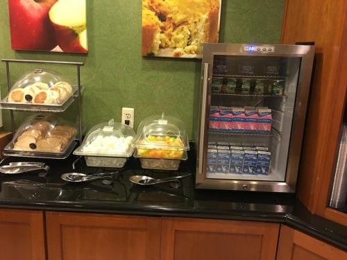 a refrigerator with food and drinks on a counter at Fairfield Inn & Suites by Marriott Fairfield Napa Valley Area in Fairfield